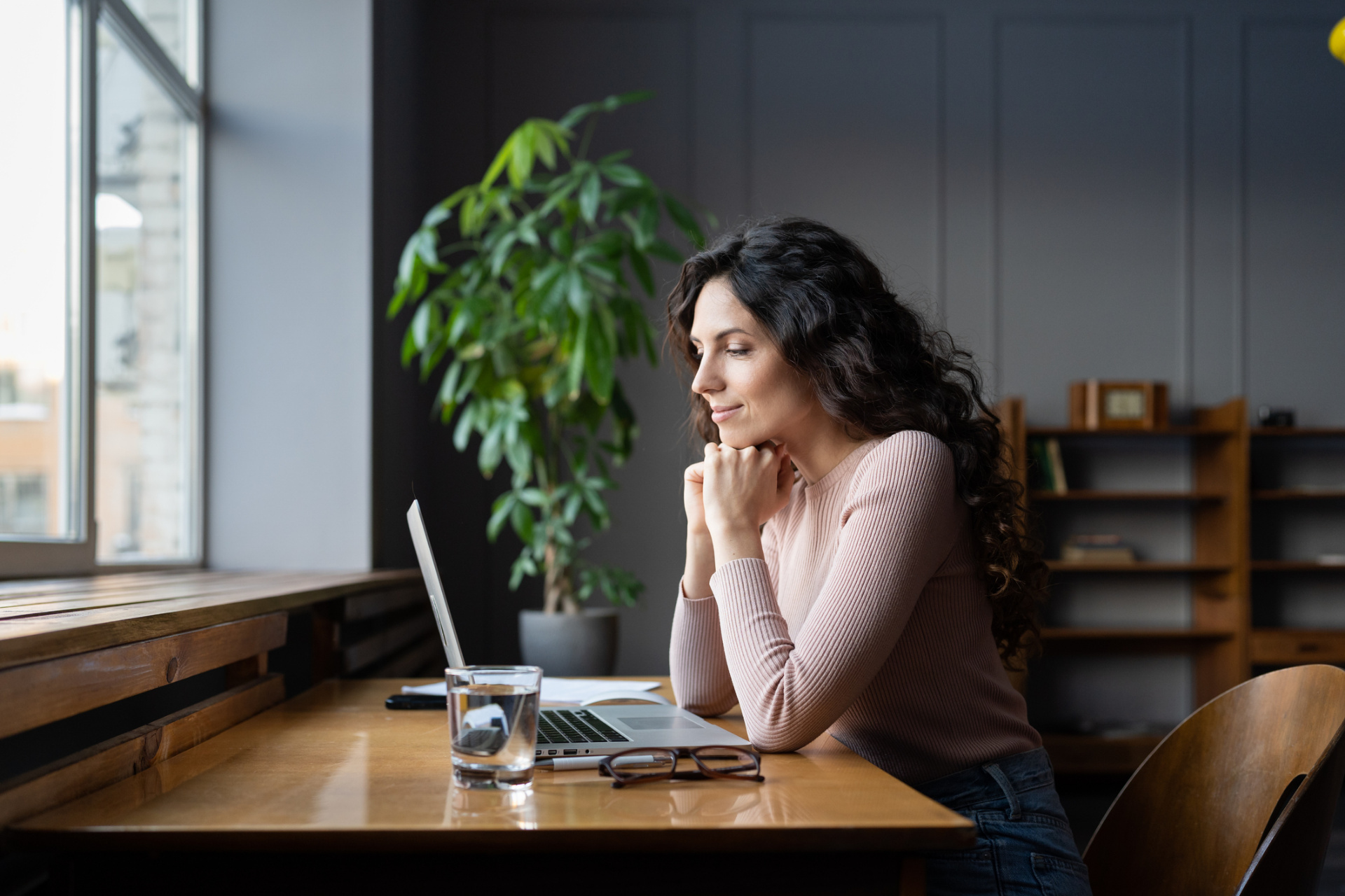 Business owner reviewing financial information in a calm workspace